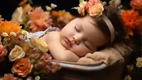 Cute little baby sleeping 4k desktop wallpaper with flower