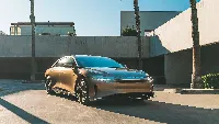 Lucid air luxury sedan car golden color 4k desktop wallpaper