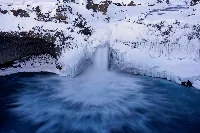 Winter ice waterfall 4k desktop wallpaper sea side view